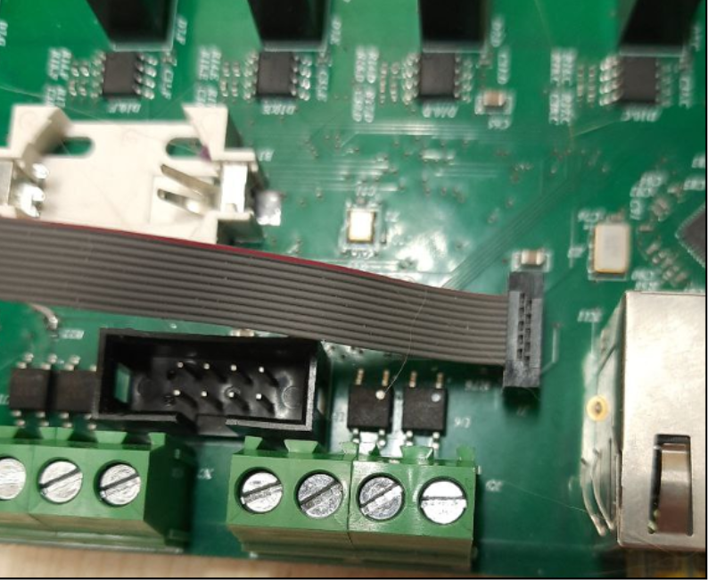 Рисунок 20 — Подключение программатора к устройству